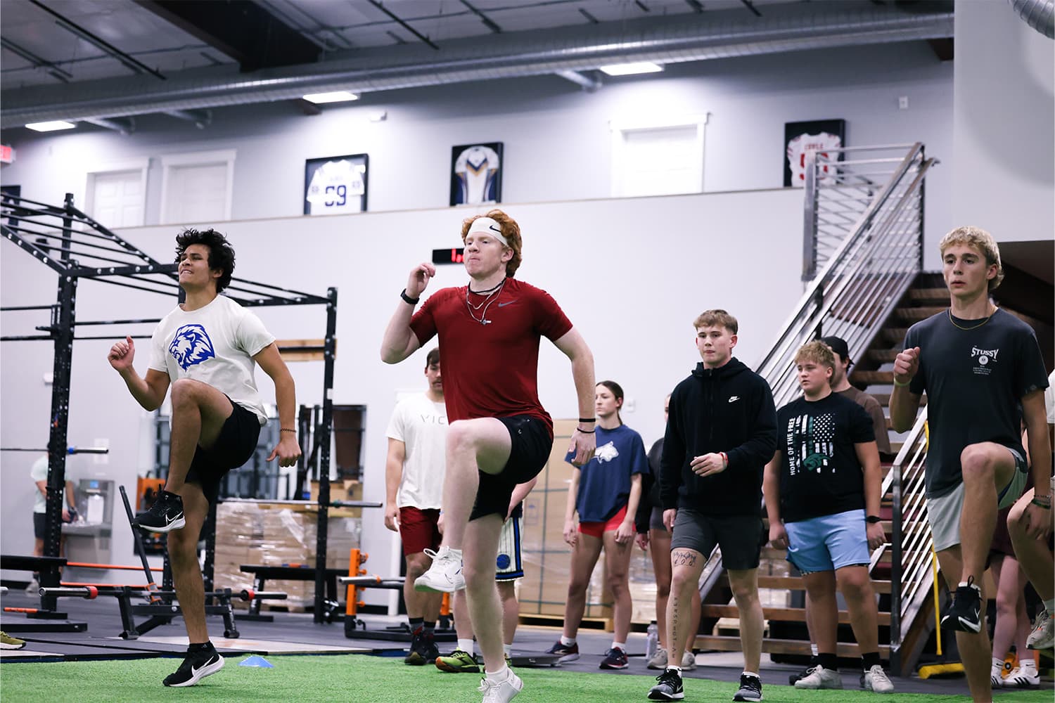 Athletes training on the Montana Performance Labs floor